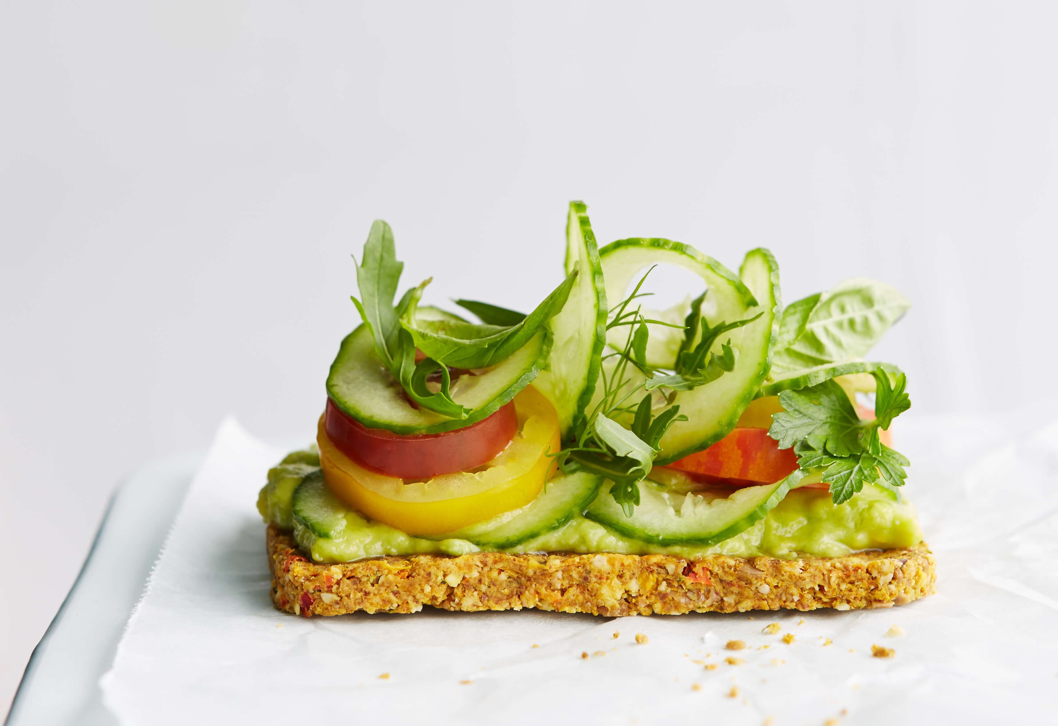 A Sandwich With Lettuce Tomato And Cheese