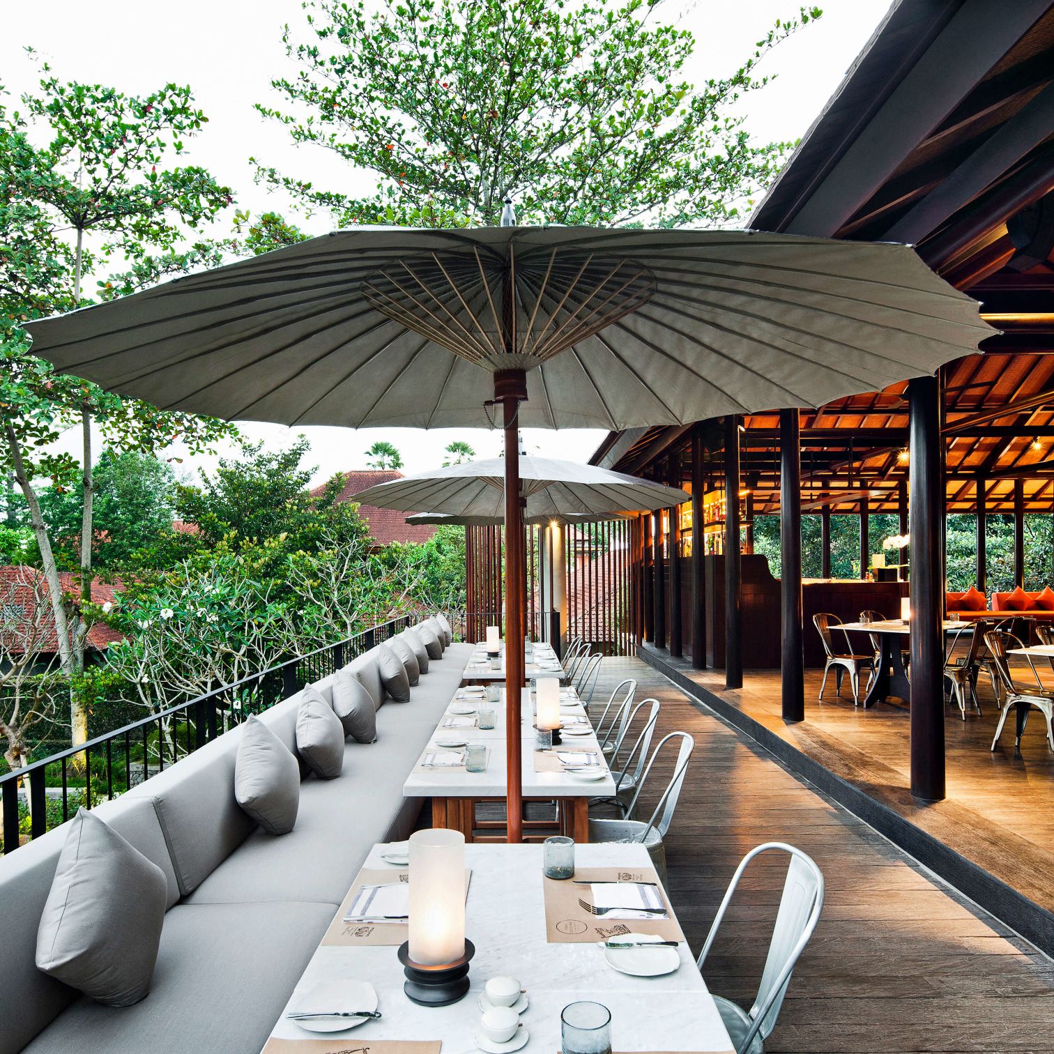 A Patio With Tables And Chairs