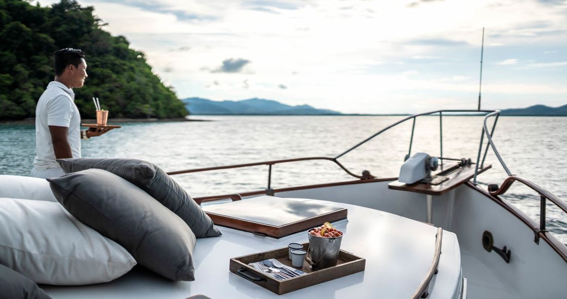 A Person Sitting On A Boat